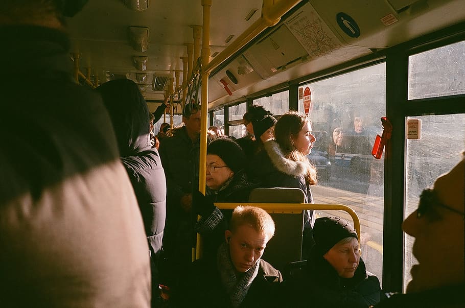 group-of-people-inside-the-bus-during-daytime